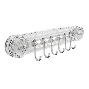 Soporte de pared transparente con ventosa y seis ganchos metálicos para el hogar y cocina.
