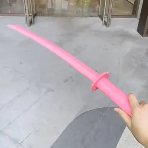 Pink 3D gravity telescopic sword toy, creative plastic samurai blade decompression toy detail view.