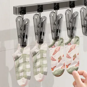 Wandmonteerbaar opvouwbaar wasdroogrek met meerdere handige clips voor sokken en ondergoed.