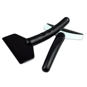 Detail shot of the black plastic car ice scraper tool, showing handle grip and protective blade cover.