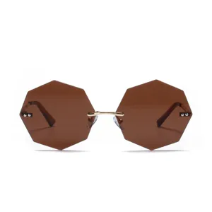 Stylish vintage octagonal rimless sunglasses with brown lenses and gold metal accents
