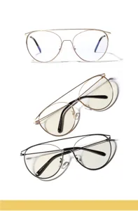Macro view of three pairs of vintage metal aviator glasses frames in gold and black