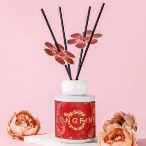 Chinese style reed diffuser home fragrance decorative bottle with floral sticks and oil.