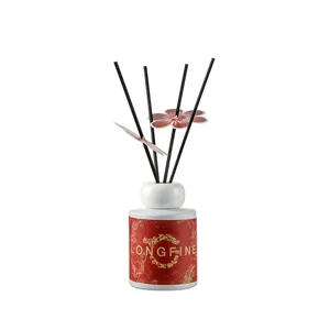 Chinese style flameless reed diffuser bottle set with floral sticks for home decor.