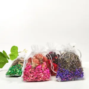 Detail view of colorful dried flower mesh sachet bags, perfect for wardrobe and car air freshener.