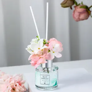 Reed diffuser home fragrance set with artificial flowers and sticks for indoor bedroom air refresh.