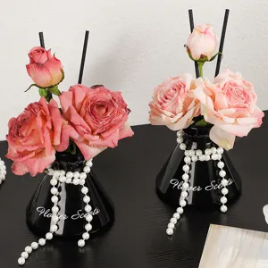 Artificial rose reed diffuser set with black vase and pearl decor for home decoration