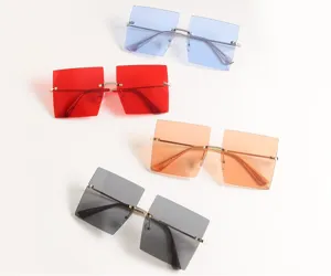 Collection of various colored oversized rimless square sunglasses for fashion styling.