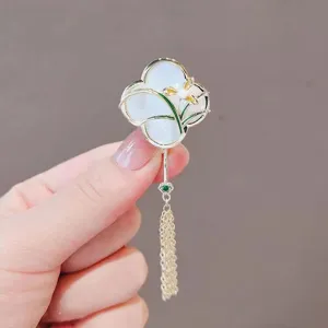 Chinese style fan brooch with delicate tassel, elegant pearl and enamel floral detail.