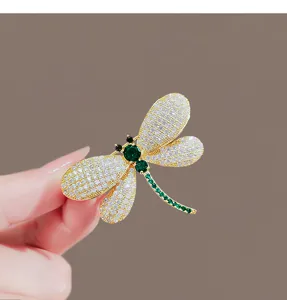 Exquisite rhinestone dragonfly brooch, luxury suit lapel pin for elegant women accessories.