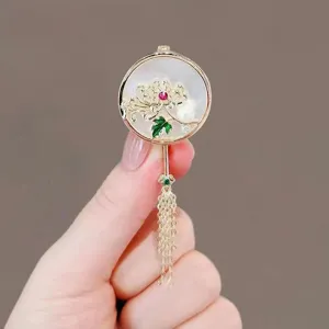 Exquisite Chinese style fan brooch with pearls, tassel and delicate floral enamel details.