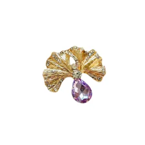 Ginkgo leaf brooch featuring sparkling rhinestones and a purple teardrop crystal for women.