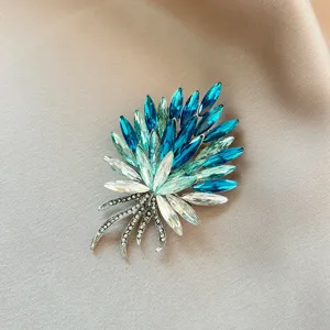 Elegant crystal rhinestone bouquet brooch pin, vintage luxury blue and green sparkling jewelry.