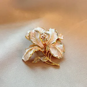 Elegant pink enamel flower brooch with sparkling rhinestones and pearls for suit dress pin.