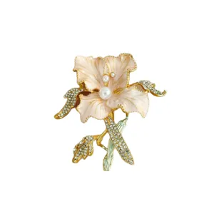 Vintage enamel flower brooch with pearls and sparkling rhinestones for elegant women suit decor.