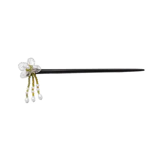 Épingle à cheveux vintage en ébène avec fleur tissée main et pompon en perle