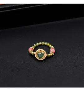 Macro view of New Chinese style beaded ring featuring a green Hetian Jade fox motif