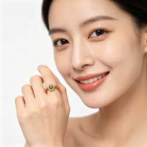 Elegant Asian model wearing a green Hetian jade fox beaded ring in new Chinese style