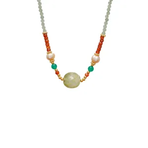 Handmade beaded necklace featuring freshwater pearls, carnelian beads and prehnite