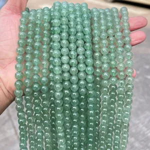 Fili di perle tonde in cristallo di fragola verde naturale per gioielli fai da te