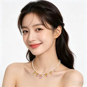 Elegante Perlenkette mit runden Perlen und rosa-gelben Kristallanhängern für Damen