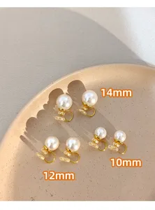 Detailed comparison view of elegant pearl clip-on earrings in 10mm, 12mm, and 14mm sizes