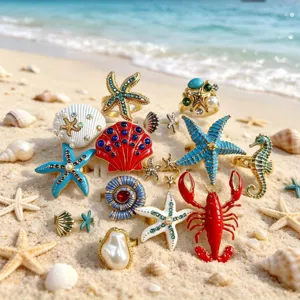 Stile resort spiaggia oceano anelli stella marina conchiglia aragosta strass perle.