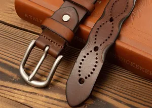 Vintage genuine leather women belt detail view showcasing exquisite metal pin buckle and hollow craft.