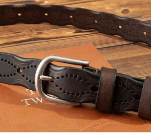 Vintage dark brown genuine leather belt detail with perforated pattern and pin buckle.