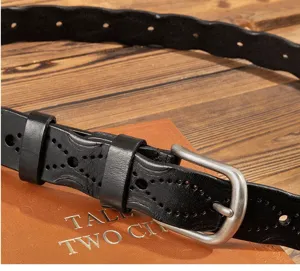 Women black genuine leather belt with retro pin buckle and delicate carved hollow pattern detail.