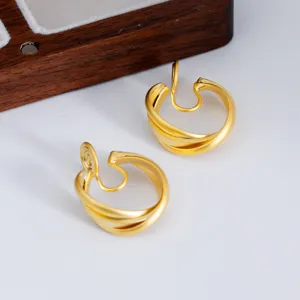 Vintage French matte gold ear clips with minimalist twisted hoop design for women.