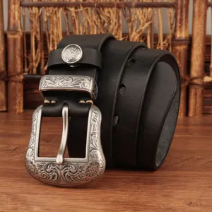 Vintage genuine leather belt for men with intricate silver-toned carved floral metal buckle.