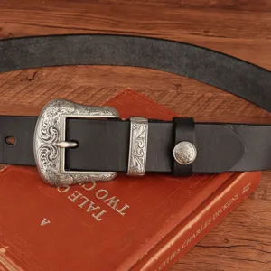 Vintage leather belt with ornate metal buckle and detailed Western floral design for men.