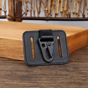 Close-up of black leather belt loop key holder featuring metal carabiner and dual slots.