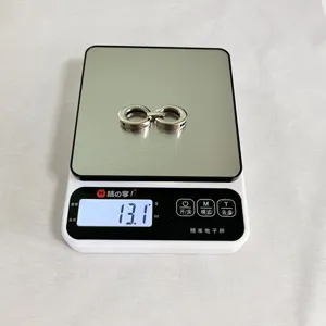 Fibbia doppia per cintura in lega di zinco, accessorio di ricambio, vista dettagliata del peso.
