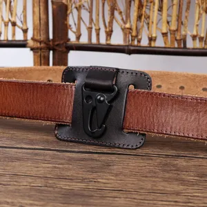 Detailed view of genuine leather belt with black metal key ring holder and hook for men.
