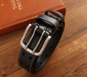 Detailed close-up of men's black leather belt featuring a vintage double-prong metal buckle.