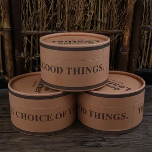 Set of three premium cylindrical kraft paper boxes with 'Good Things' print for belts and scarves