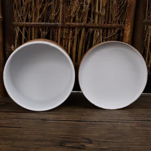 Internal detail view of round cardboard packaging tubes featuring clean white lining