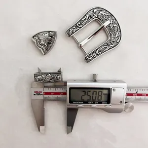 Vintage zinc alloy floral engraved belt buckle 3-piece set accessory close-up view