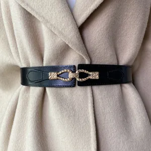 Women fashion wide leather belt detail shot, elegant black waist cincher for winter coat dress