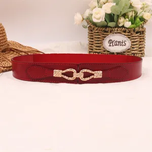 Red wide leather elastic belt detail, elegant gold buckle accessory for dress coat cincher