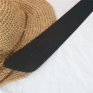 Detailed shot of women's black wide waist belt with size detail, versatile dress accessory