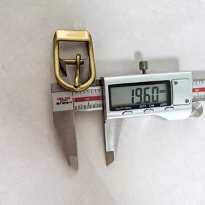 Close-up detail of the metal pin buckle inner diameter measurement using a digital caliper.