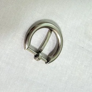 Close-up detail of silver zinc alloy metal D-ring buckle, smooth polished surface finish.