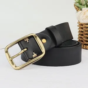 Detail view of retro black genuine leather belt with antique brass pin buckle and handmade stitches.