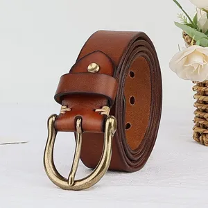 Retro genuine leather men's belt with stylish metal horseshoe buckle, casual denim trousers accessory.