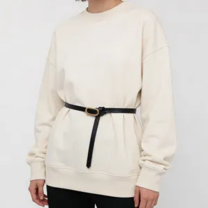 Minimalist thin women's leather belt with stylish oval metal buckle casual waist accessory.