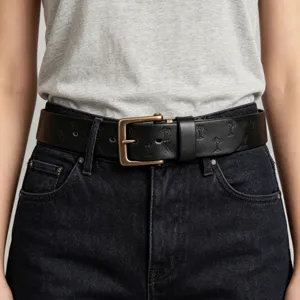 Men's premium leather belt featuring a vintage brass pin buckle and subtle embossed detail.