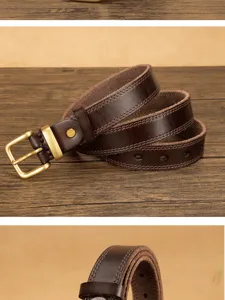 Detailed close-up of a dark brown leather belt with brass pin buckle and double stitching.